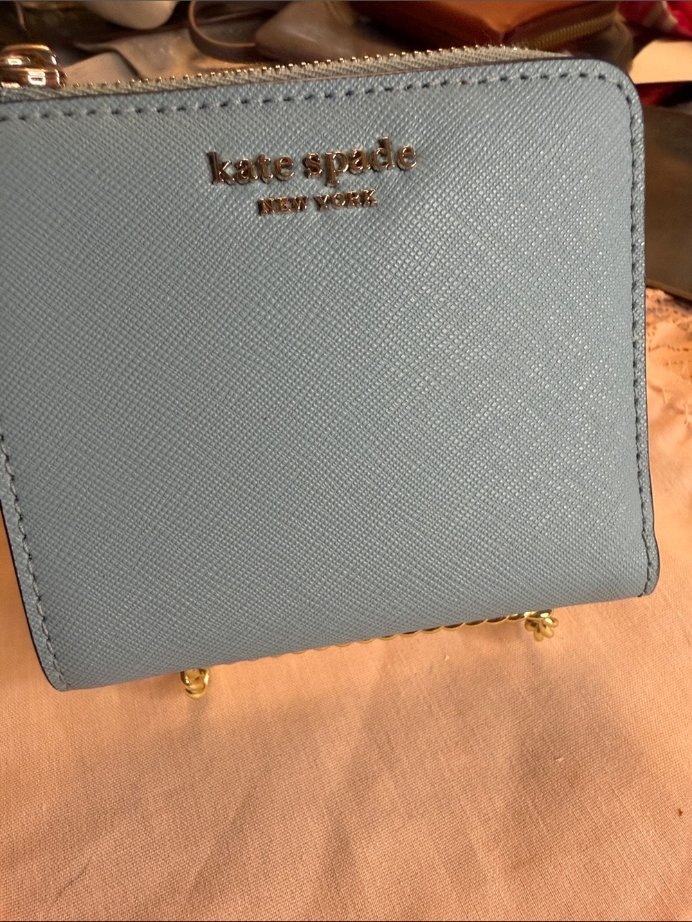 kate spade Light Blue Saffiano Zip Wallet with Gold Logo